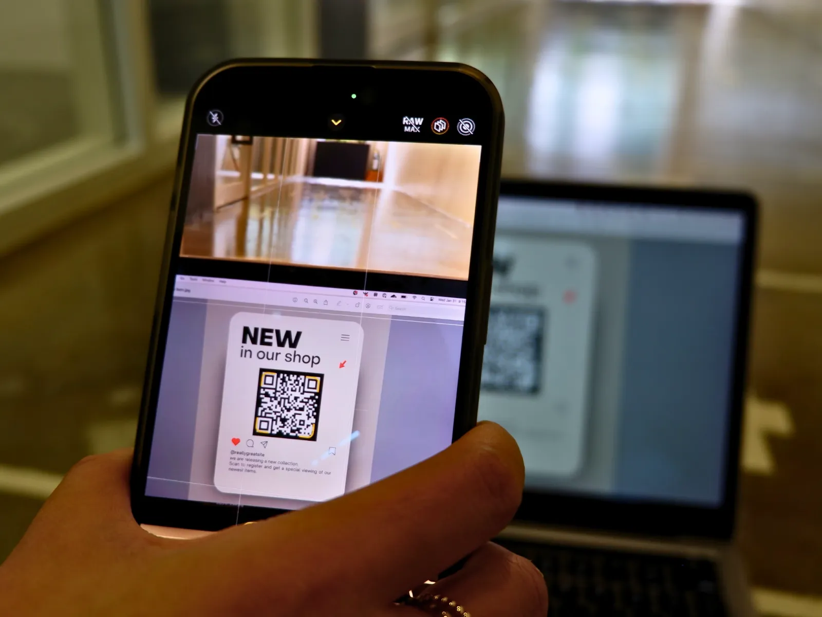 A photo of a hand holding a phone up to scan a QR code