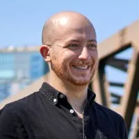 Portrait of Carmine Paolino, Founder and CEO of Chat with Work, outdoors